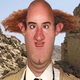 A September 2001 file photo of <i>Mad</i> reporter Fonebone while on assignment near the Blecchistani city of Plort.